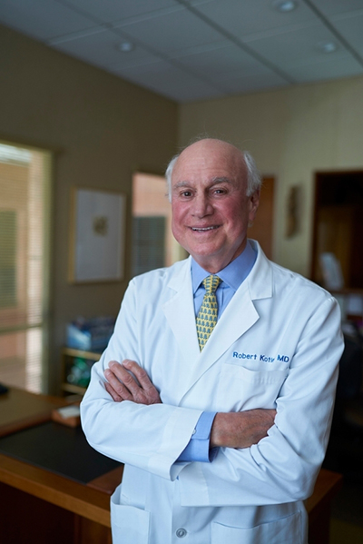 Dr. Kotler, Beverly Hills Rhinoplasty Specialist, in a white doctor's coat