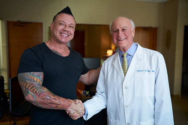Rhinoplasty surgeon, Dr. Kotler, shakes hands with a patient